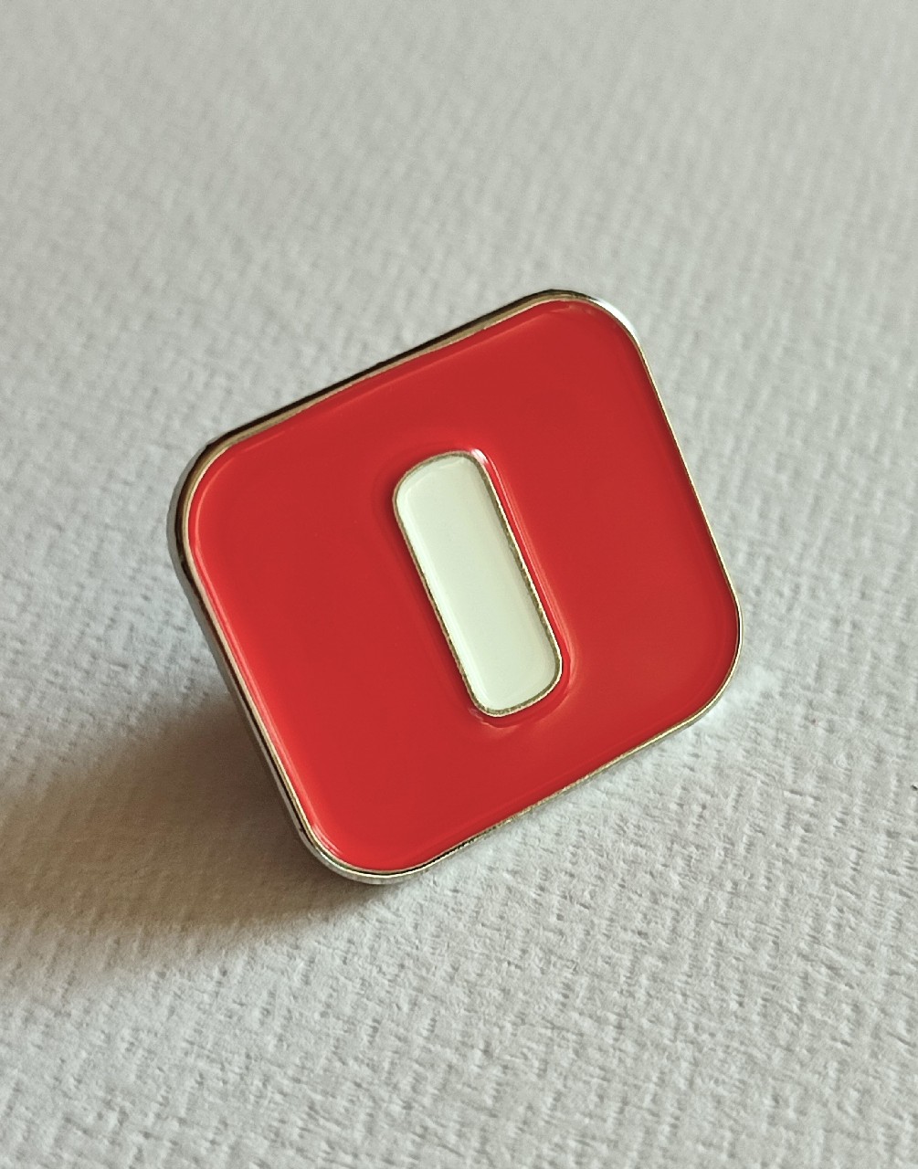 Olivetti pin